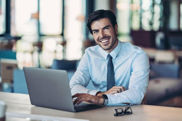 istock Businessman with a laptop 1280151227