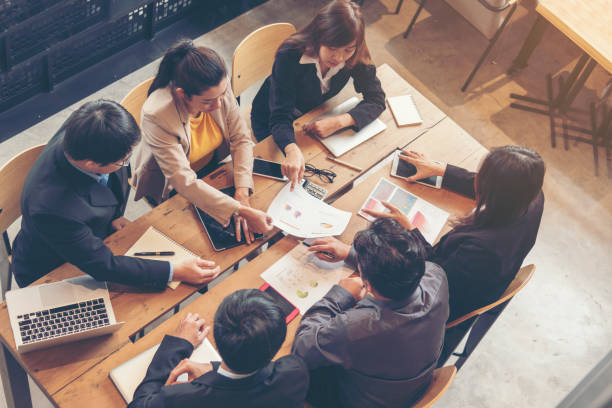 istock Teamwork Concept. Collaboration Team Meeting Communication with Business Teamwork Working Together in Conference Room. Top view of Diversity Partner Business Meeting Trust in Businessman and Team. 1280153301