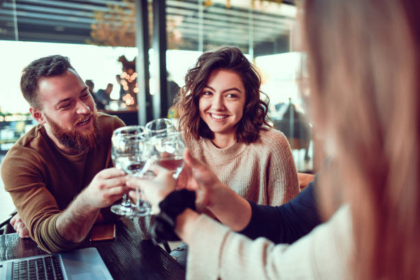 istock Celebratory Toast With Water By Smiling Friends 1280153986