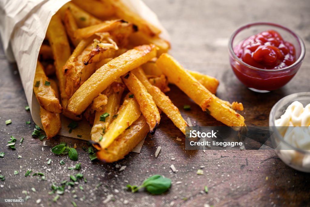 Diverse Keto Dishes French fries with turnip and parmesan, Quebec, Canada French Fries Stock Photo