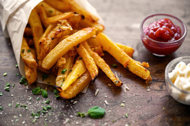 Diverse Keto Dishes French fries with turnip and parmesan, Quebec, Canada french fries stock pictures, royalty-free photos & images