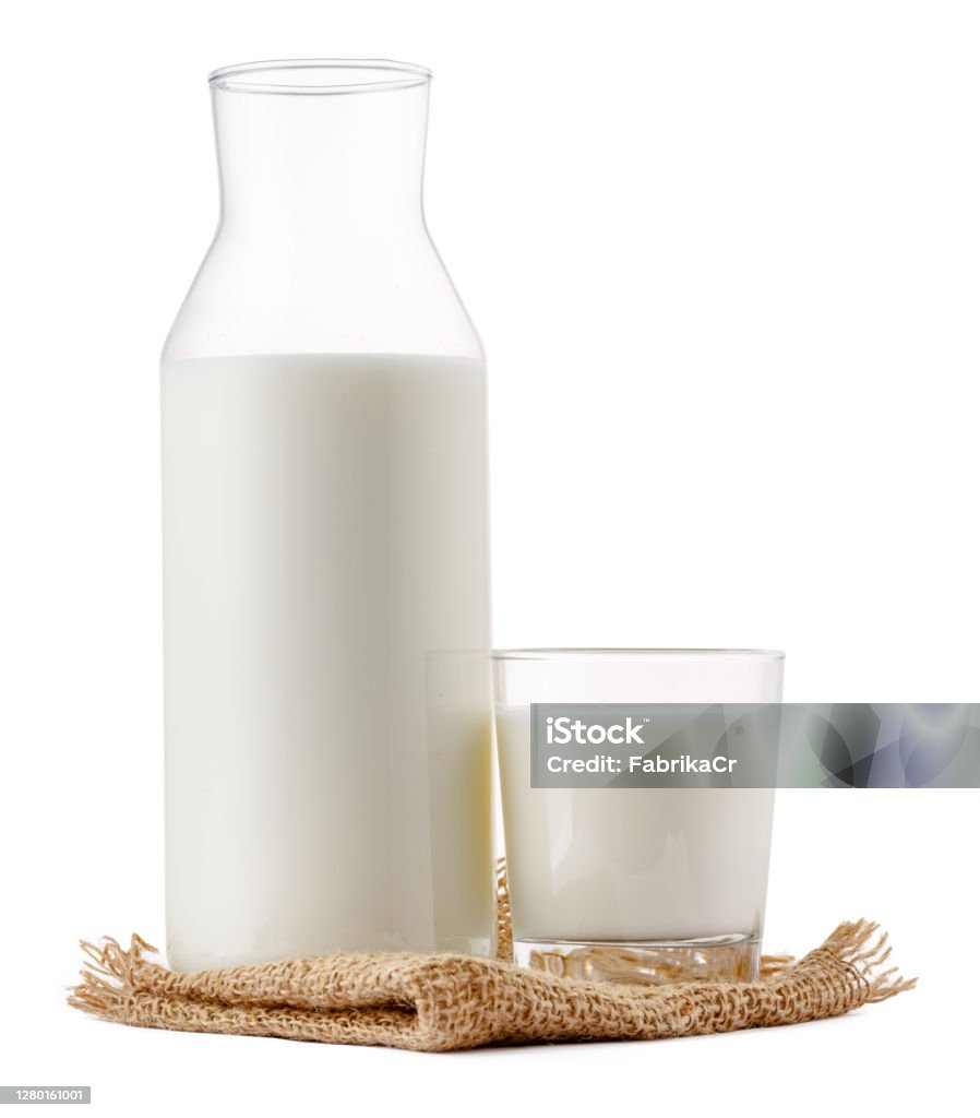 Glass bottle and cup of fresh milk isolated Glass bottle and cup of fresh milk isolated on white Milk Stock Photo