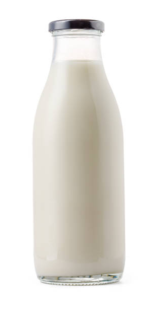 istock Closed glass milk bottle isolated on white background 1280161039