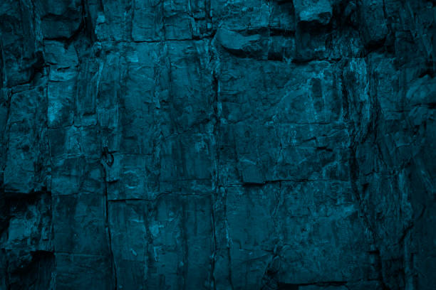 istock Toned rock texture. Blue green stone background. Mountain surface texture. Detail. 1280162928