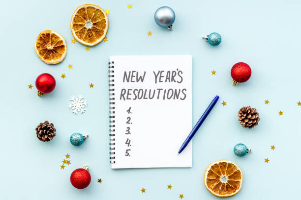 istock 2021 New Year's resolutions with Christmas decorations. Overhead view 1280165533