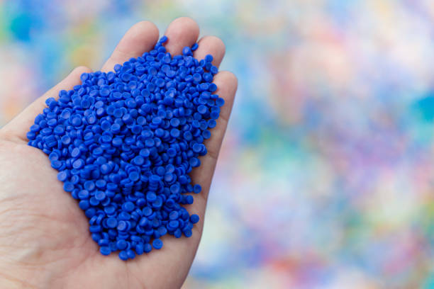 istock Close-up of plastic polymer granules. hand hold Polymer pellets. polymer plastic. compound polymer. 1280168678