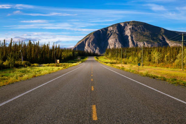 istock Scenic Route, Alaska Hwy, during a sunny and cloudy sunset. 1280169138