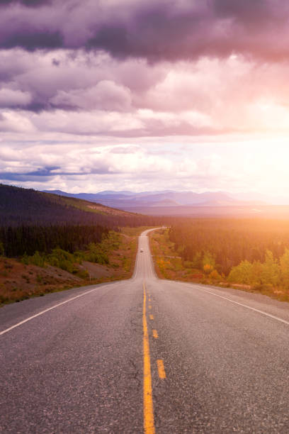 istock Scenic Route, Alaska Hwy, during a sunny and cloudy day 1280170495