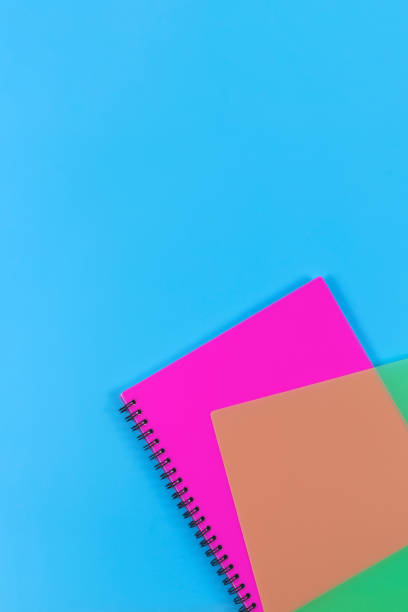 istock Blue background with office supplies 1280170524