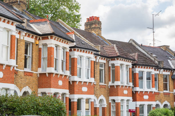 english terraced houses with a for sale sign in crouch end, london - house housing development uk housing problems imagens e fotografias de stock