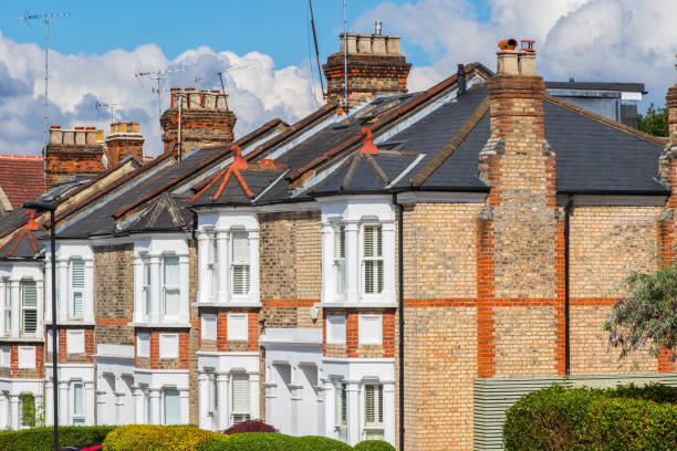 An end of Victorian terraced houses in Crouch End, London An end of Victorian terraced houses featuring bay windows in Crouch End, north London window chimney london england residential district stock pictures, royalty-free photos & images