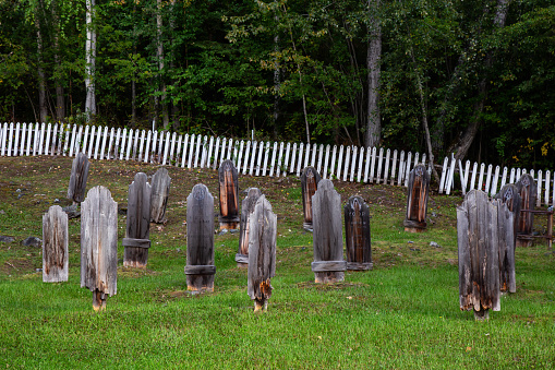 Dawson City, Yukon, Canada - August 27, 2020: Cemetery in a small touristic town during a cloudy summer day.
