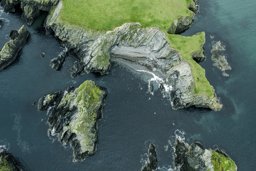 Aerial view of the rocky coastline of St Ninian's Isle, Shetland Islands.