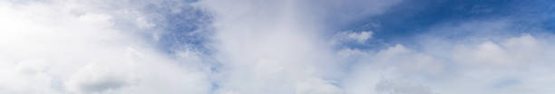 istock Image of a partly cloudy and partly clear sky during the day 1280174615