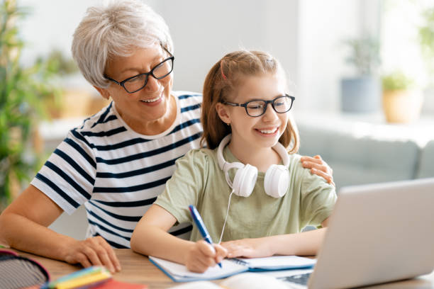 istock Girl doing homework or online education. 1280174765