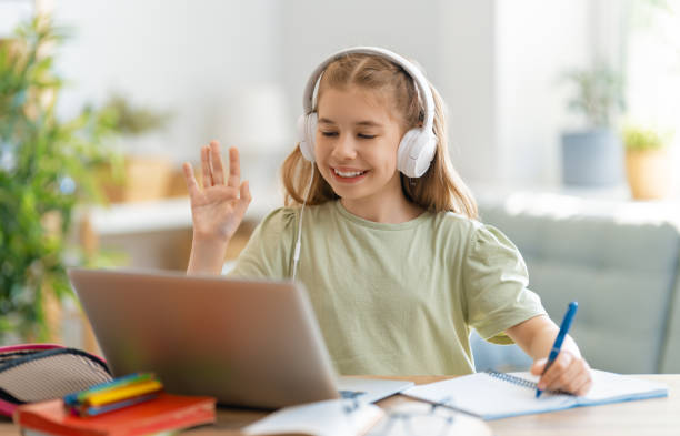 istock Girl doing homework or online education. 1280174801