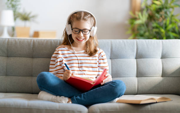 istock Girl doing homework or online education. 1280174810