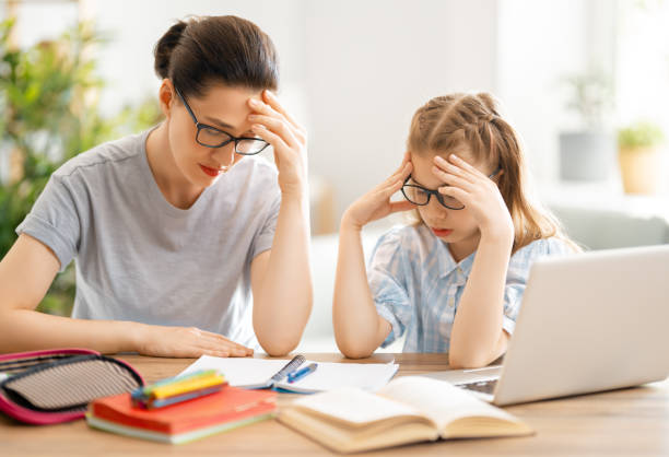 istock Girl doing homework or online education. 1280174811