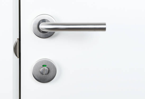 istock fragment white door with handle and keyhole 1280175757