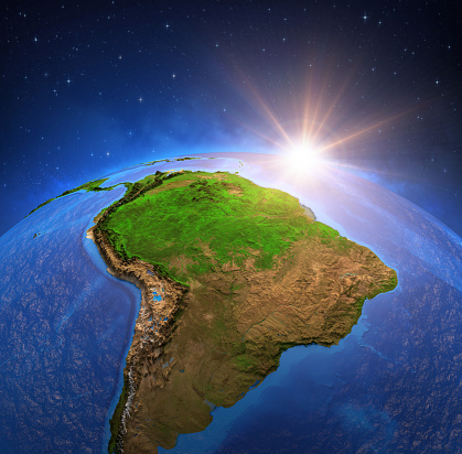 Surface of the Planet Earth viewed from a satellite, focused on South America and Amazon rainforest, sun rising on the horizon. Physical map of Amazonia - Elements of this image furnished by NASA (https://eoimages.gsfc.nasa.gov/images/imagerecords/73000/73776/world.topo.bathy.200408.3x5400x2700.jpg).