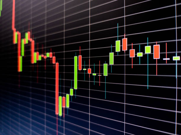 istock Abstract candlestick chart on dark blue digital screen. Stock market data chart, graph with rectangular grid on blue background. 1280176028