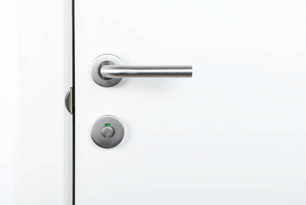 istock fragment white door with handle and keyhole 1280176159