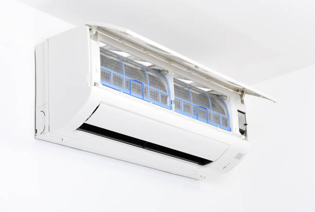 istock Air conditioner system on white wall room. Air conditioning.A white air conditioner is installed on a white wall in the apartment. 1280176505