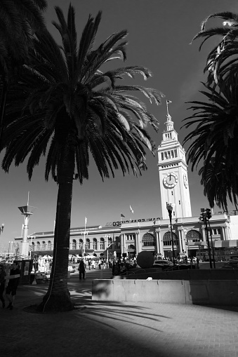 San Francisco, CA/USA - 2/1/2020: City of San Francisco, Embarcadero, Ferry Building Clock Tower, at Fisherman's wharf on a sunny afternoon in black and white