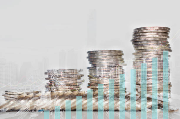 istock double exposure of city with row of coin stack with growth chart and graph progress report for business investment finance banking and money saving concept. 1280178882