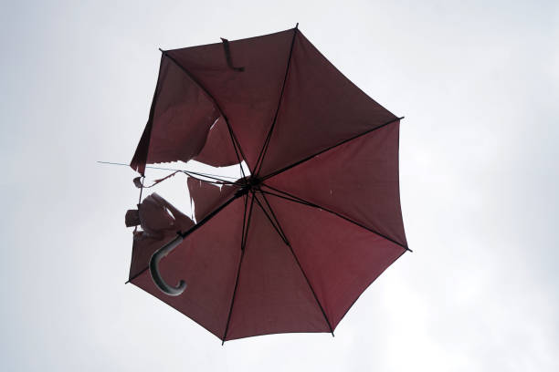 Broken umbrella On the background of the sky