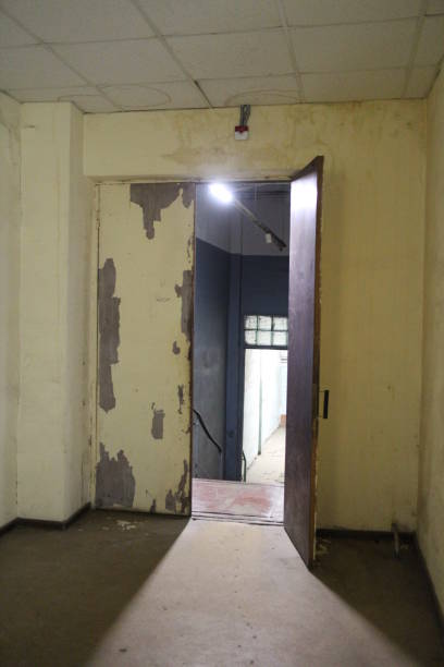 istock A door in the dim light in an industrial building 1280179287