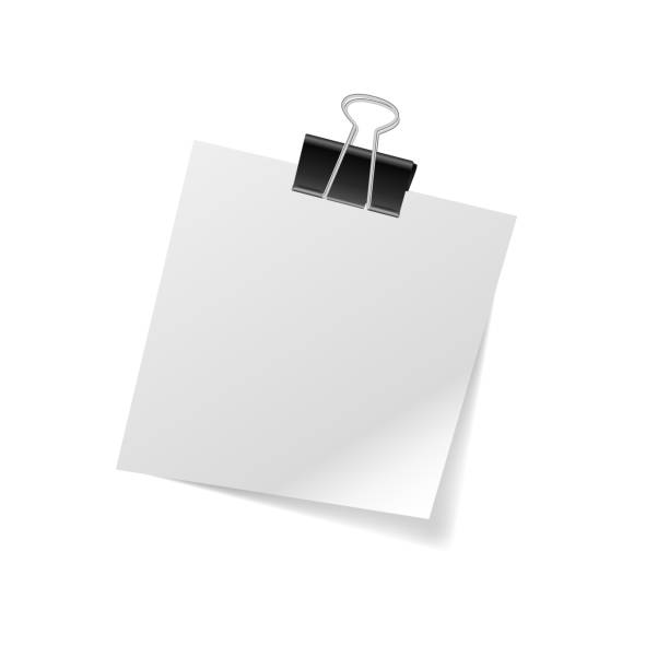istock White sticky note paper with curled corner. Realistic vector illustration of post it paper with paper clip. 1280184309