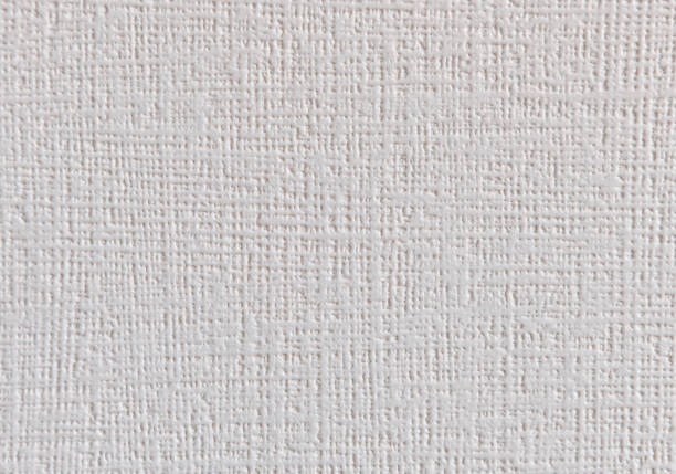 Beige wallpaper with an embossed striped texture.