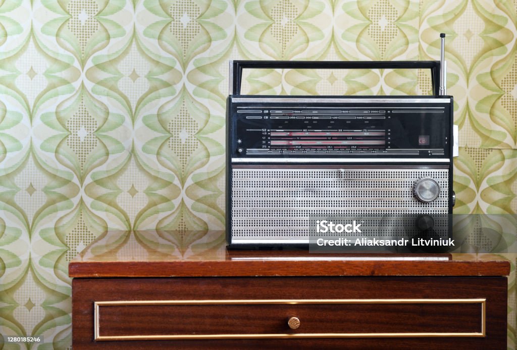Retro Radio On The Table Against The Background Of Vintage Wallpaper Stock  Photo - Download Image Now - iStock