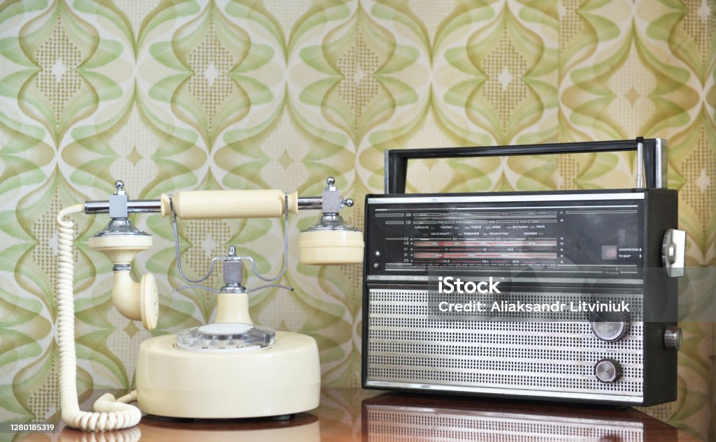 Retro Radio On The Table Against The Background Of Vintage Wallpaper Stock  Photo - Download Image Now - iStock
