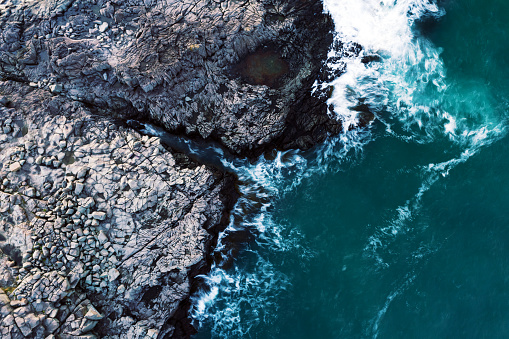 Drone view of Nova Scotia's Bay of Fundy coast in evening light.