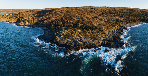 Drone view of Nova Scotia's Bay of Fundy coast in evening light.