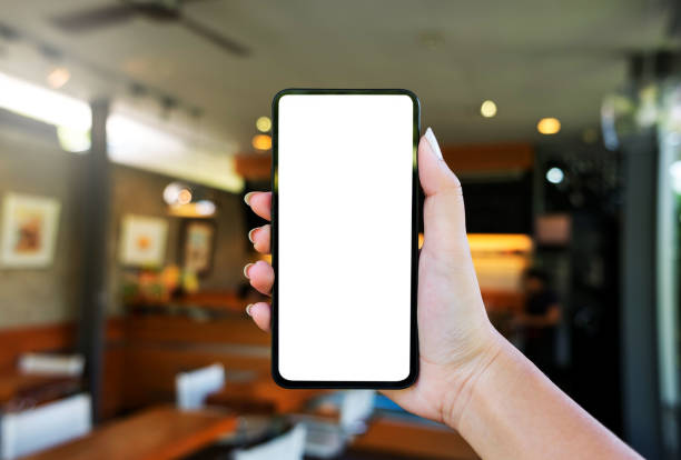 istock Woman hand holding empty blank screen mobile smart phone. 1280185693