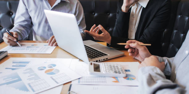 istock Financial auditor calculating with valuation data report. 1280185699