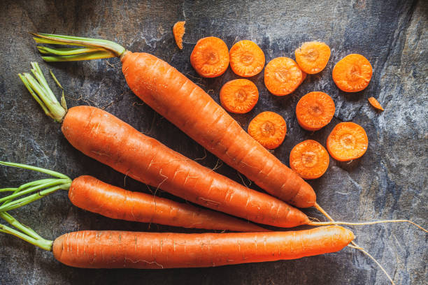 istock Photo of carrot and kitchen knife 1280186046