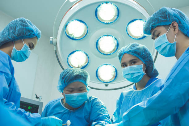 istock Medical team doing surgical operation at hospital 1280186110