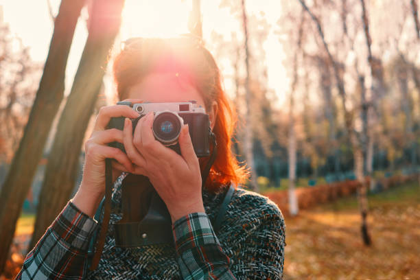 istock Person with camera in autumn. 1280188242