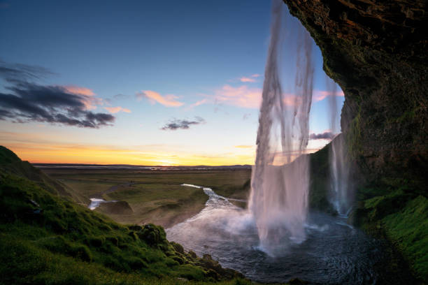 istock Seljalandsfoss waterfall at sunset, Iceland 1280188272