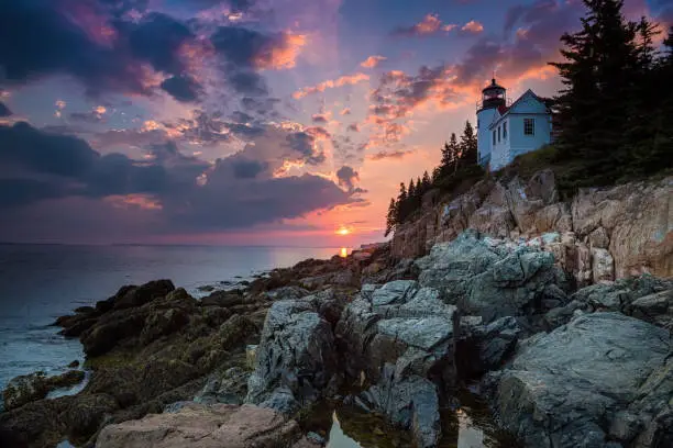 Photo of Bass Harbor Lighthouse an sunset. Mount Desert Island, Maine, USA.