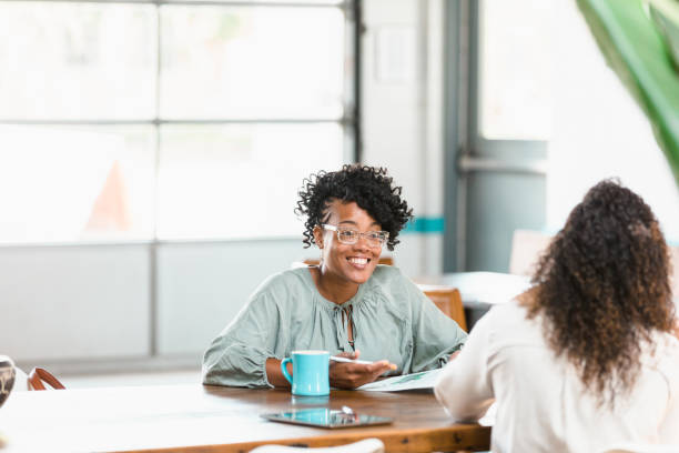 istock Businesswoman discusses marketing strategy with client 1280190254