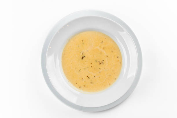 istock cheese soup in a white plate on a white background 1280196695
