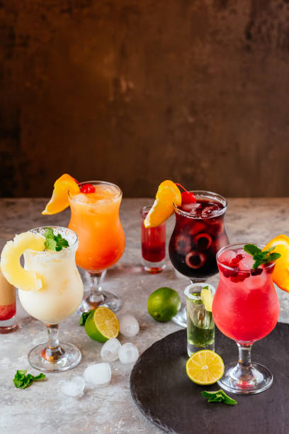 istock bright summer alcoholic cocktails on a gray background 1280196721