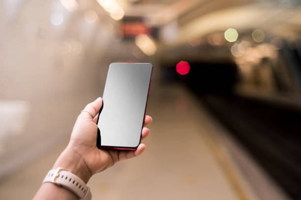 istock Mock up smart phone on a subway station. 1280197307