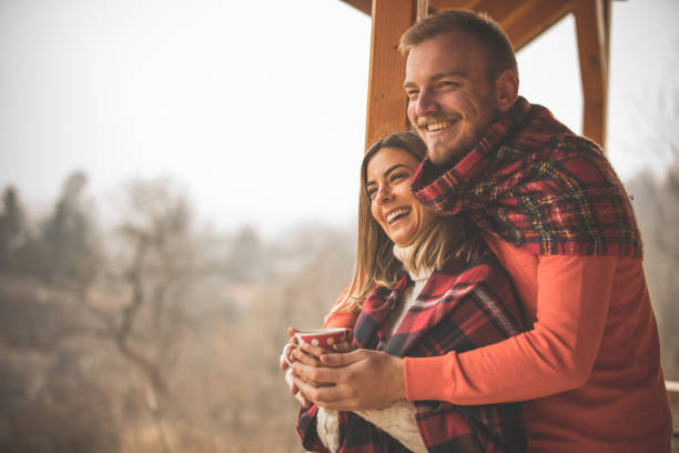 istock Couple enjoying the view and cuddling on their weekend getaway 1280201935