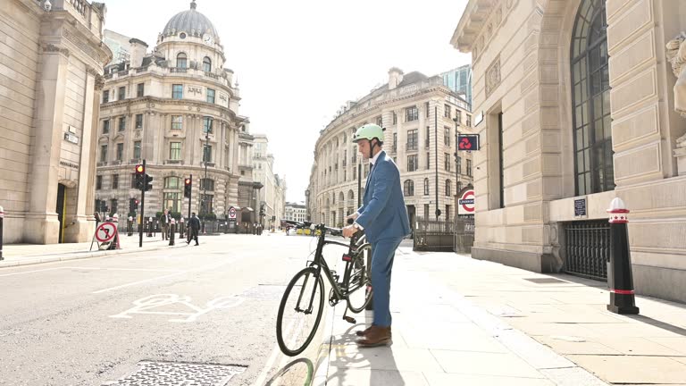 Early 30s British white collar worker commuting by bicycle